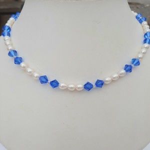 Baroque Pearls and blue crystal necklace. 18 inches long
